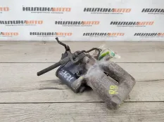 Суппорт тормозной VOLKSWAGEN Passat B6 3C0615404E, задний правый