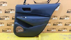 Обшивка двери задняя правая Toyota Corolla E210