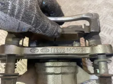 Суппорт тормозной передний правый KIA K5 3 G4FP