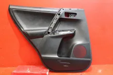 Обшивка двери задняя левая Toyota Rav4 CA40