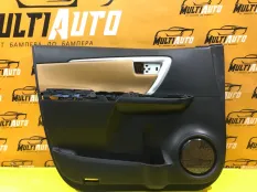 Обшивка двери передняя левая Toyota Hilux 8