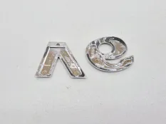 эмблема Volkswagen Touareg