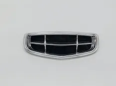 эмблема Geely Monjaro