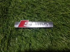 эмблема Audi Q7