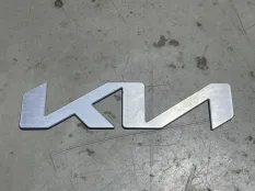 эмблема Kia