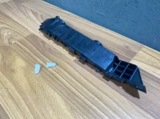 Кронштейн бампера STKA48000B2, передний левый