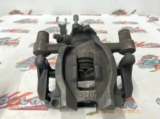 Суппорт тормозной BMW F48 29.07.2016 34206883033 B48O, задний левый