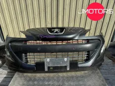 Бампер передний Peugeot 308 1 поколение серый