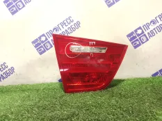 Фонарь задний левый BMW E90