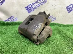 Суппорт тормозной передний левый Ford Focus 2