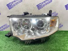 Фара передняя левая Mitsubishi Pajero Sport 2