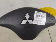 Подушка безопасности в руль Mitsubishi L200 2007 7030A851XA KB4T
