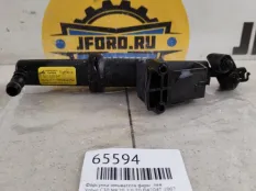 Форсунка омывателя фары Volvo C30 2007 31253730 MK20, левая