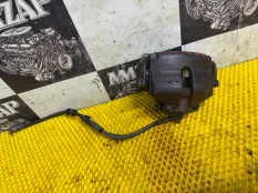 Суппорт тормозной передний левый VOLKSWAGEN POLO