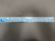 Эмблема Toyota Land Cruiser