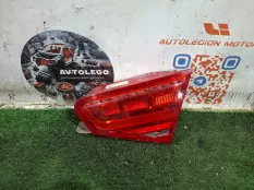Фонарь в крышку багажника правый Audi A8