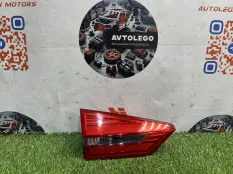 Фонарь в крышку багажника левый Geely Atlas