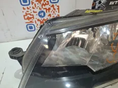 Фара левая Skoda Octavia