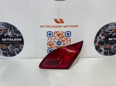Фонарь в крышку багажника правый Opel Astra