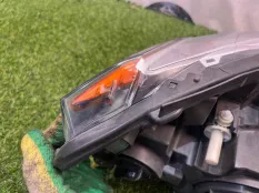 Фара левая BMW X1