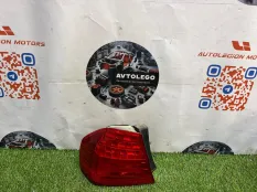 Фонарь левый BMW 328XI