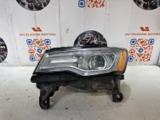 Фара левая Jeep Grand Cherokee