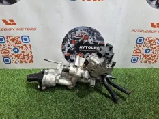 Корпус термостата Kia Carnival