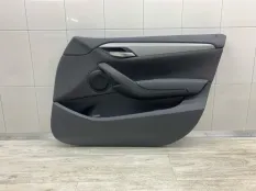 Обшивка двери BMW X1
