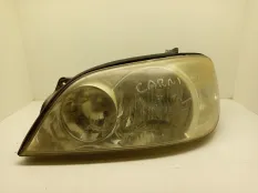 Фара левая Kia Carnival 2000