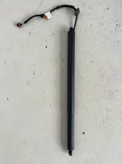 Амортизатор багажника Geely Tugella