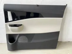 Обшивка двери Kia Carnival
