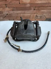 Суппорт передний правый Toyota RAV4