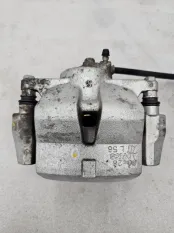 Суппорт тормозной передний левый Toyota RAV4 XA50