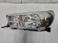 Фара левая Toyota Hilux