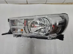 Фара левая Toyota Hilux