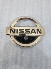 Эмблема решетки радиатора Nissan X-Trail T32