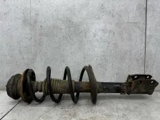 Стойка амортизатора передняя левая Renault Logan (2004 - 2009) 8200807029