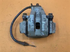 Суппорт тормозной задний левый Toyota Tundra XK50