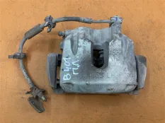 Суппорт тормозной передний левый Jeep Grand