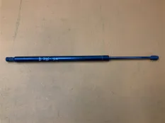 Амортизатор крышки багажника левый Chevrolet Tahoe