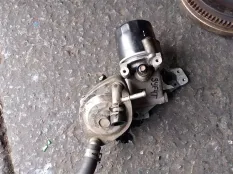 Корпус масляного фильтра MAZDA TITAN SYF4