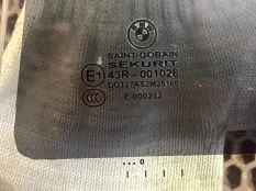 Стекло двери боковое BMW 7