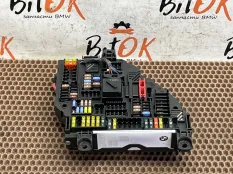 Блок предохранителей в багажнике BMW X3