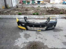 Передний бампер Nissan Almera
