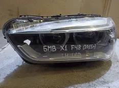 Фара левая BMW X1