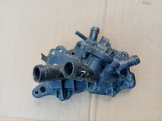 Корпус термостата Skoda Octavia