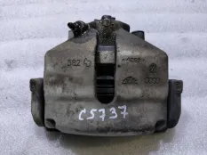 Суппорт тормозной Volkswagen Jetta 6