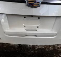 Ручка наружняя крышки багажника (пятой двери) Cadillac Escalade / Tahoe 23339223 ; 23104923 121358