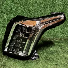 Фара передняя левая Cadill 133216