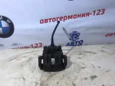 Суппорт тормозной BMW X1 2011 34216768697 E84 N20B20A, задний левый